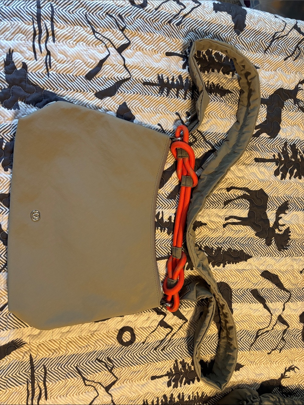 Gray Crossbody Bag with Orange Accent Strap